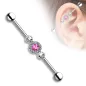 Piercing industriel trois gemmes rose