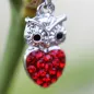 Piercing nombril hibou coeur rouge