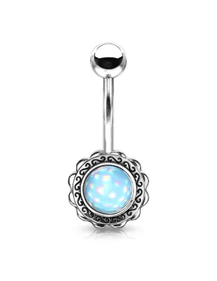 Piercing nombril fleur pierre lumineuse bleue