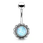 Piercing nombril fleur pierre lumineuse bleue