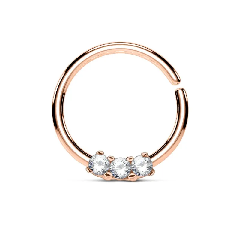 Piercing septum pliable rosé trois gemmes blancs