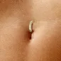 Piercing nombril titane doré anneau serti de strass