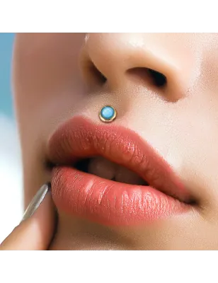 Piercing labret oreille doré pierre époxy lumineuse bleu