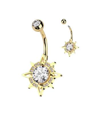 Piercing nombril doré boussole pavée de strass