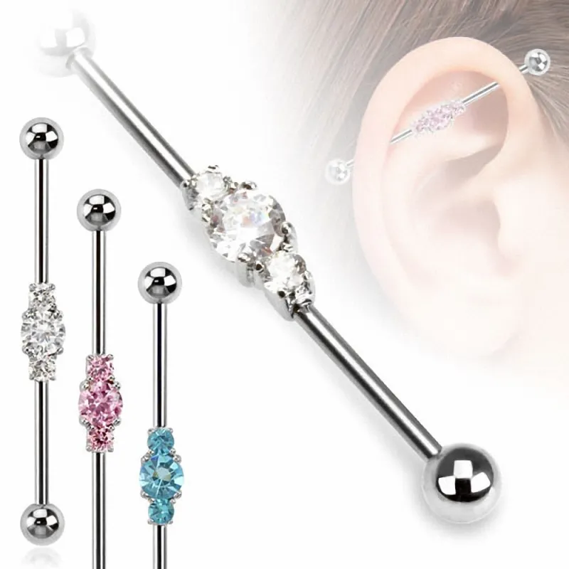 Piercing industriel oreille trois pierres